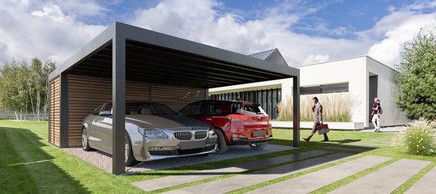 Carport in Grau mit Holzverkleidung hinten für Stauraum.